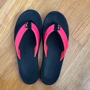 Nike black and bright coral Flip Flops